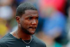 Sprinter Justin Gatlin čeká na start závodu na 100 metrů během americké kvalifikace v Eugene 2012.