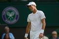 Český tenista Tomáš Berdych je zklamaný po prohraném utkání s Lotyšem Ernestem Gulbisem v 1. kole Wimbledonu 2012