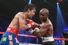 Manny Pacquiao a Timothy Bradley v souboji welterova váhy o titul mistra světa WBO