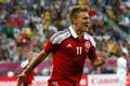 Nicklas Bendtner se raduje po vstřelení gólu v utkání Dánska s Portugalskem na Euru 2012
