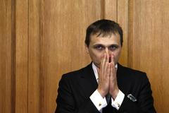 Vít Bárta u soudu při čtení rozsudku na fotografii Reuters