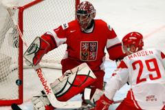 Jakub Kovář a Morten Madsen v utkání MS v hokeji 2012 Česko - Dánsko