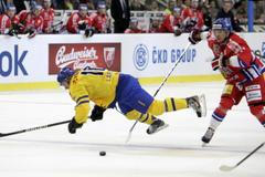 České hokejové hry Česko - Švédsko (Petr Koukal, Johan Larsson)