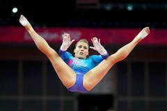 Trénink gymnastek na olympiádě v Londýně 2012 (Kanaďanka Dominique Peggová)