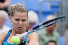 Česká tenistka Lucie Šafářová v utkání s Australankou Samanthou Stosurovou během Rogers Cupu 2012 v kanadském Montrealu.