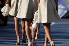 Partnerky evropských golfistů během zahájení golfového 39. Ryder Cupu v americkém Medinahu.