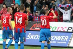 Fotbalisté Plzně David Limberský, Radim Řezník a Pavel Horváth v utkání se Spartou Praha v sedmém kole Gambrinus ligy 2012/13.