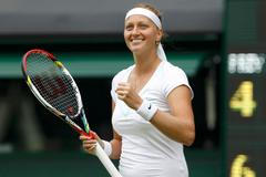 Česká tenistka Petra Kvitová se raduje z vítězství nad Akgul Amanmuradovou z Uzbekistánu v 1. kole Wimbledonu 2012.
