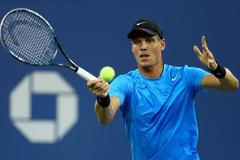 Český tenista Tomáš Berdych hraje se Švýcarem Rogerem Federerem na US Open 2012.