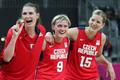 České basketbalistky Ilona Burgrová, Hana Horáková a Eva Vítečková (zleva) se radují z vítězství v utkání skupiny A s Chorvatskem na OH 2012 v Londýně.