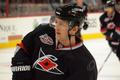 Český hokejista Jiří Tlustý v dresu Caroliny Hurricanes v NHL 2011/12.
