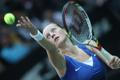 Česká tenistka Petra Kvitová v utkání Fed Cupu 2012 proti Srbce Aně Ivanovičové.