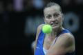 Česká tenistka Petra Kvitová v utkání Fed Cupu 2012 proti Srbce Aně Ivanovičové.