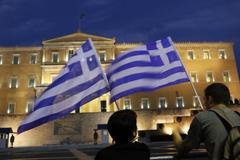 Foto: Návštěva Merkelové v Řecku vzbudila vlnu vášní