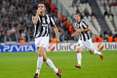 Fotbalista Juventusu Leonardo Bonucci (vlevo) slaví gól v utkání Ligy mistrů 2012/13 proti Šachťaru Doněck.