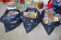 Sklad nelegálního alkoholu a griotka s metanolem