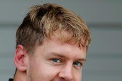 Sebastian Vettel se raduje z vítězné kvalifikace na VC Japonska v Suzuce