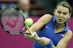 Česká tenistka Lucie Šafářová ve finále Fed Cupu 2011 proti Rusku.