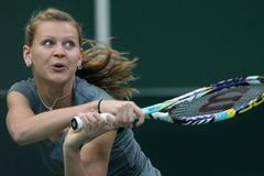 Česká tenistka Lucie Šafářová v exhibičním utkání v pražské O2 aréně.