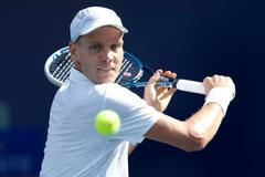 Tomáš Berdych v zápase s Kamkem (Dubaj 2013)