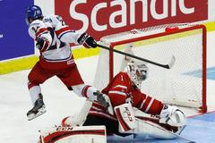 Czech Republic's Simon scores the game winning goal on Canada's goalie Paterson during a shootout in their IIHF World Junior Championship ice hockey game in Malmo
