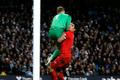 Liverpool's Suarez collides with Manchester City's Hart during their English Premier League soccer match in Manchester