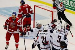 Team USA's players celebrate a goal in front of Czech Republic's Sulak and Dolejs during their IIHF World Junior Championship ice hockey game in Malmo