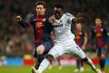 Real Madrid - FC Barcelona: Michael Essien -  Lionel Messi