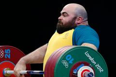 Damon Kelly ve finále vzpírání na OH 2012