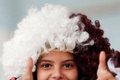 Mladý fanoušek Kataru na fotbalovém turnaji Gulf Cup