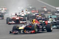 Red Bull Formula One driver Vettel leads the field on turn one of lap one during the Indian F1 Grand Prix at the Buddh International Circuit in Greater Noida