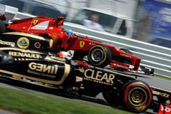 Fernando Alonso (Ferrari), Kimi Räikkönen (Lotus)