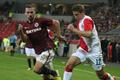 Fotbalista pražské Slavie Luboš Tusjak (vpravo) běží vedle Josefa Hušbauera v utkání 9. kola Gambrinus ligy 2012/13 se Spartou.