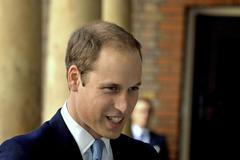 Princové William a George na křtu