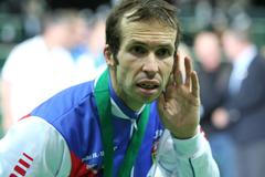 Čeští tenisté se radují z vítězství ve finále Davis Cupu 2012 proti Španělsku.