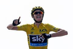 Race leader's yellow jersey Team Sky rider Froome of Britain