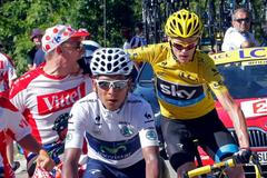 20. etapa Tour de France 2013 (Chris Froome strká do fanouška, před nimi Quintana)