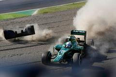 Caterham Formula One driver van der Garde of Netherlands crashes during the Japanese F1 Grand Prix at the Suzuka circuit