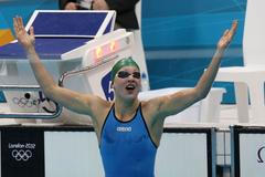 Litevská plavkyně Ruta Meilutyteová se raduje z vítězství na OH v Londýně 2012