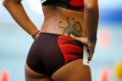 Tetování Taslakianová na MS v atletice 2013