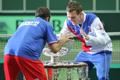 Čeští tenisté se radují z vítězství ve finále Davis Cupu 2012 proti Španělsku.