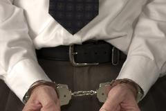 Kriminalita / Zatčení / Policejní pouta / Ilustrační snímek / Obchod / Machinace / Manažer / Politik