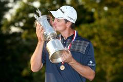 Justin Rose s trofejí za vítězství v US Open