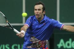 Čeští tenisté se radují z vítězství ve finále Davis Cupu 2012 proti Španělsku.