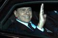 Historický snímek: Silvio Berlusconi po rezignaci opouští premiérskou rezidenci v Římě.