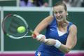Česká tenistka Petra Kvitová v utkání Fed Cupu 2012 proti Srbce Aně Ivanovičové.