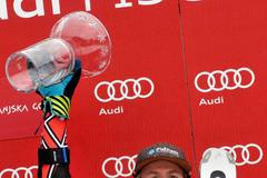 Ted Ligety s malým glóbem za obří slalom v sezoně 2012/13