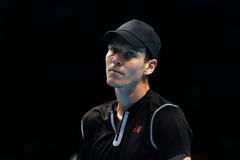 Berdych při zápase s Wawrinkou na Turnaji mistrů 2013