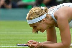 Sabine Lisická po výhře nad Serenou Williamsovou na Wimbledonu