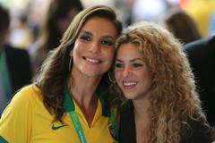 Singer Shakira from Colombia poses with Brazil singer Ivete